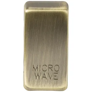 Switch cover "marked MICROWAVE" - antique brass