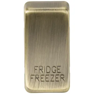 Switch cover "marked FRIDGE FREEZER" - antique bra